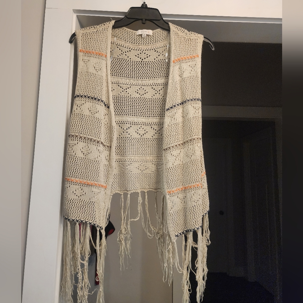 Womens sleeveless cardigan/ Vest.